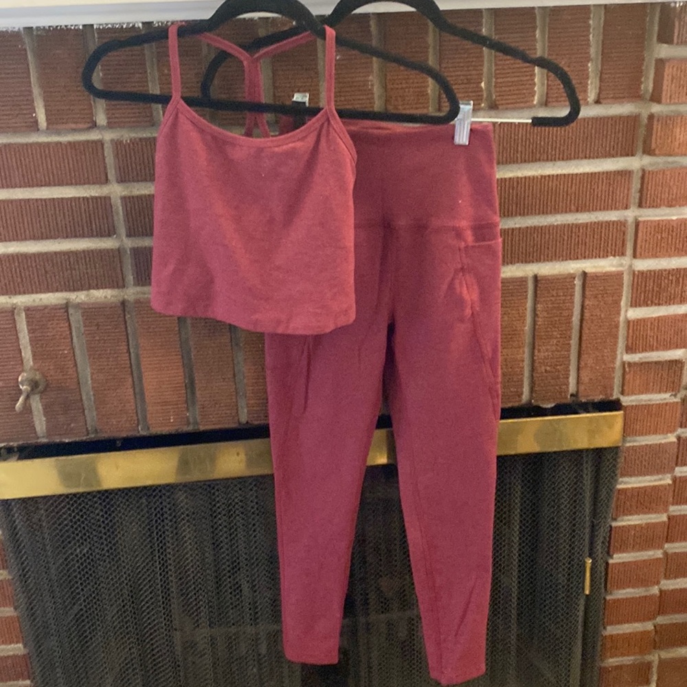Beyond Yoga set in sliding leggings and tank top.